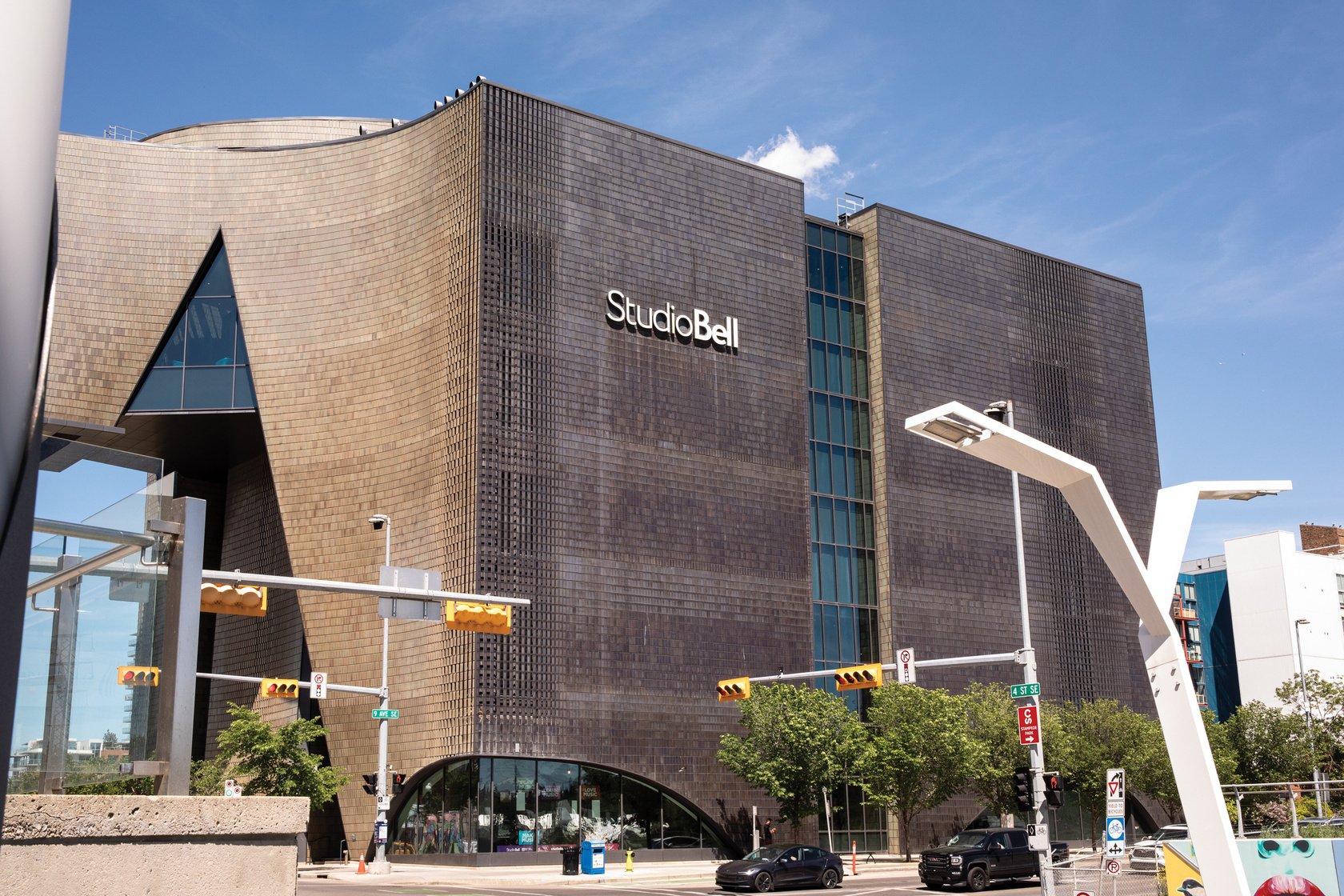 a large building that is made out of metal with the words Studio Bell on the side.