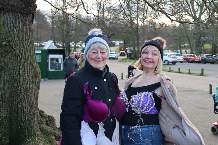two women wearing bras outside their clothes