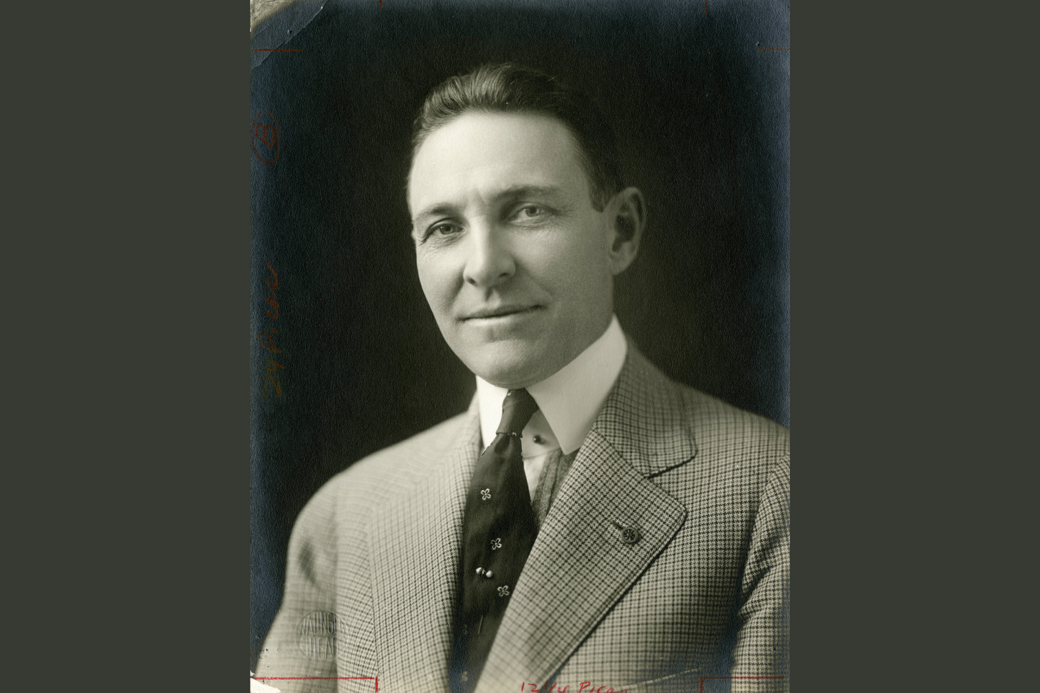 An old headshot of Arch C Klumph, President of Rotary International in 1917, wearing a suit.